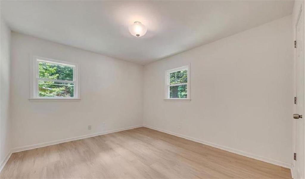 4520 Santa Fe Trail Southwest Atlanta, GA 30331 - Photo 14 of 19 an empty room with a window