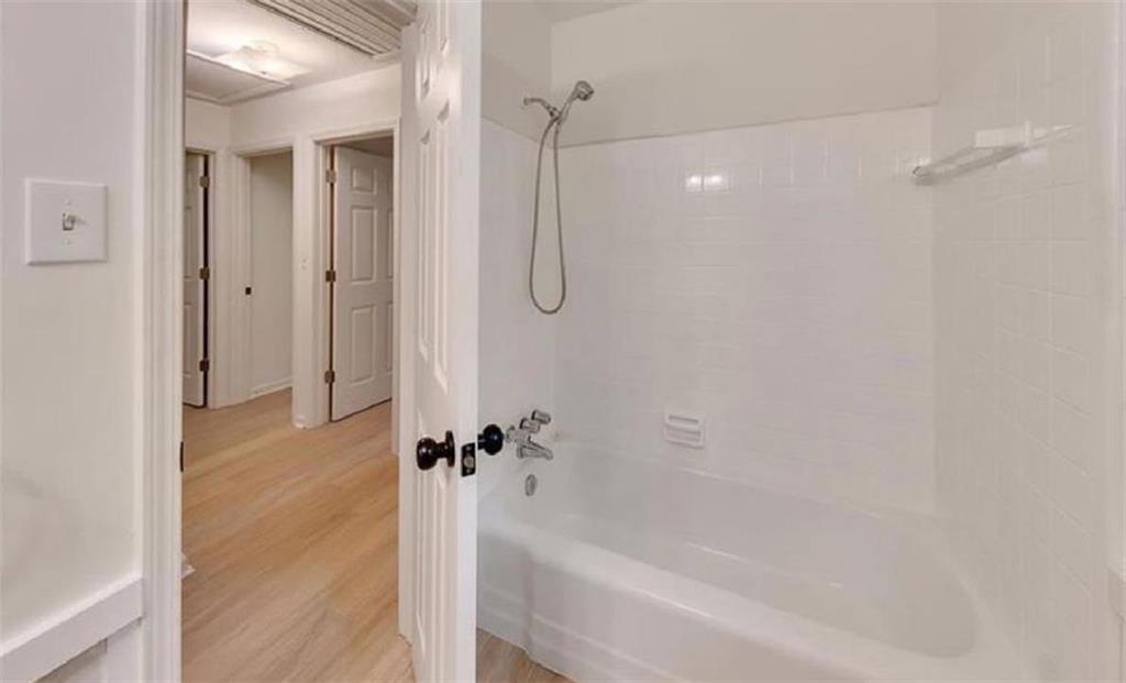 4520 Santa Fe Trail Southwest Atlanta, GA 30331 - Photo 16 of 19 a bathroom with a bathtub