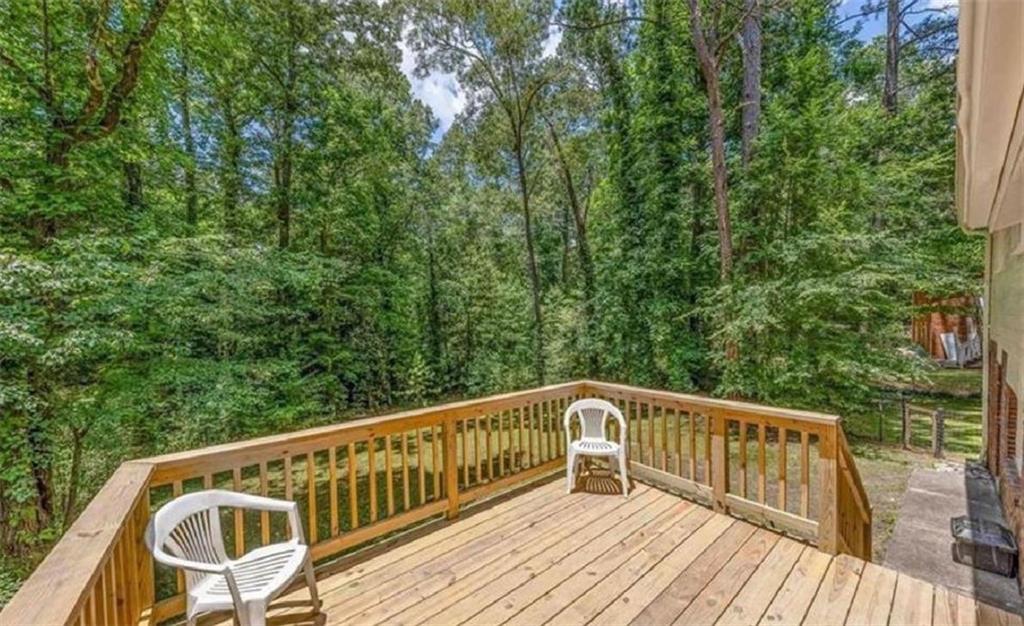 4520 Santa Fe Trail Southwest Atlanta, GA 30331 - Photo 18 of 19 a view of balcony with wooden floor and fence