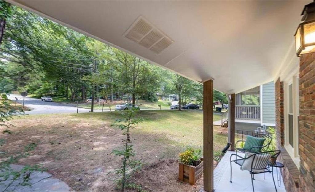 4520 Santa Fe Trail Southwest Atlanta, GA 30331 - Photo 2 of 19 a view of a patio with furniture and garden