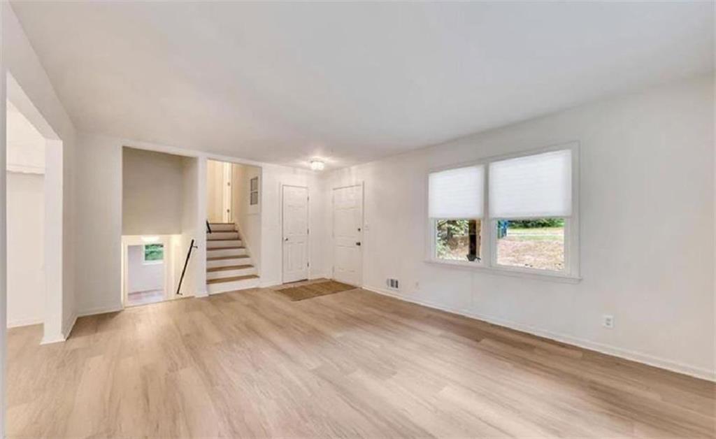 4520 Santa Fe Trail Southwest Atlanta, GA 30331 - Photo 3 of 19 a view of an empty room with a window
