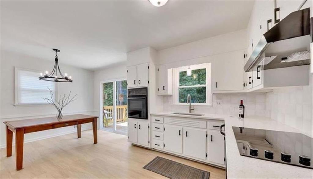 4520 Santa Fe Trail Southwest Atlanta, GA 30331 - Photo 6 of 19 a kitchen with cabinets a sink and appliances
