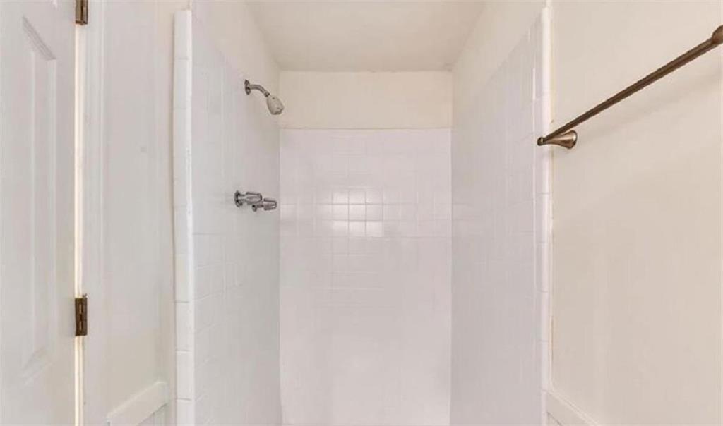 4520 Santa Fe Trail Southwest Atlanta, GA 30331 - Photo 10 of 19 a bathroom with a shower