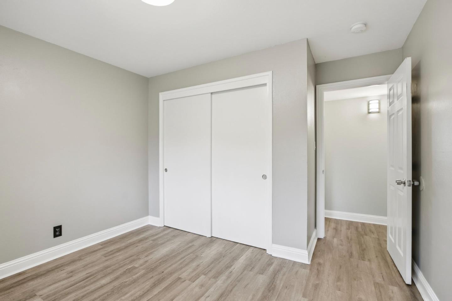 2100 Tiny Street Milpitas, CA 95035 - Photo 18 of 41 a view of an empty room with wooden floor