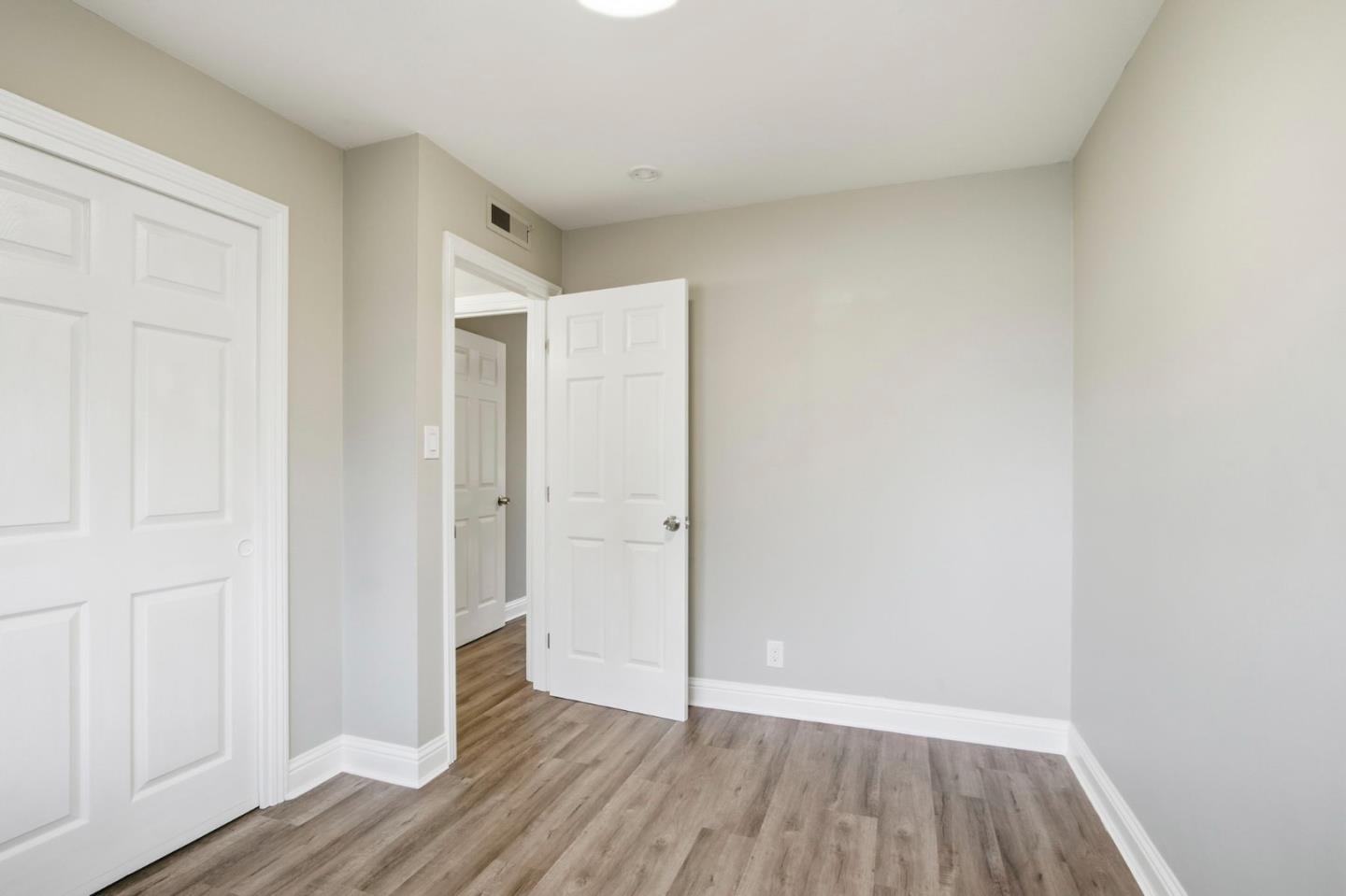 2100 Tiny Street Milpitas, CA 95035 - Photo 21 of 41 a view of an empty room with wooden floor