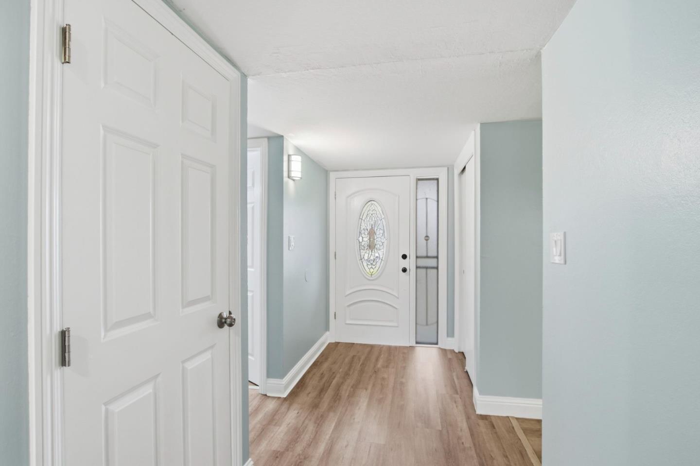 2100 Tiny Street Milpitas, CA 95035 - Photo 25 of 41 a view of a hallway with wooden floor