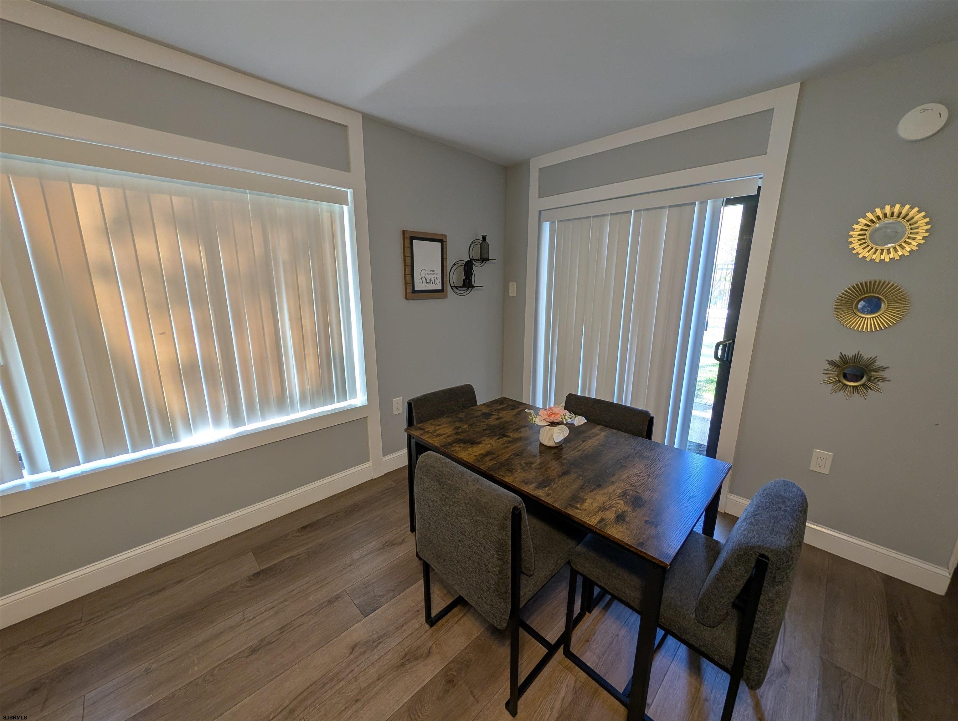 600 Pacific Avenue, Unit D102 Atlantic City, NJ 08401 - Photo 13 of 35 a table and a chair in a room
