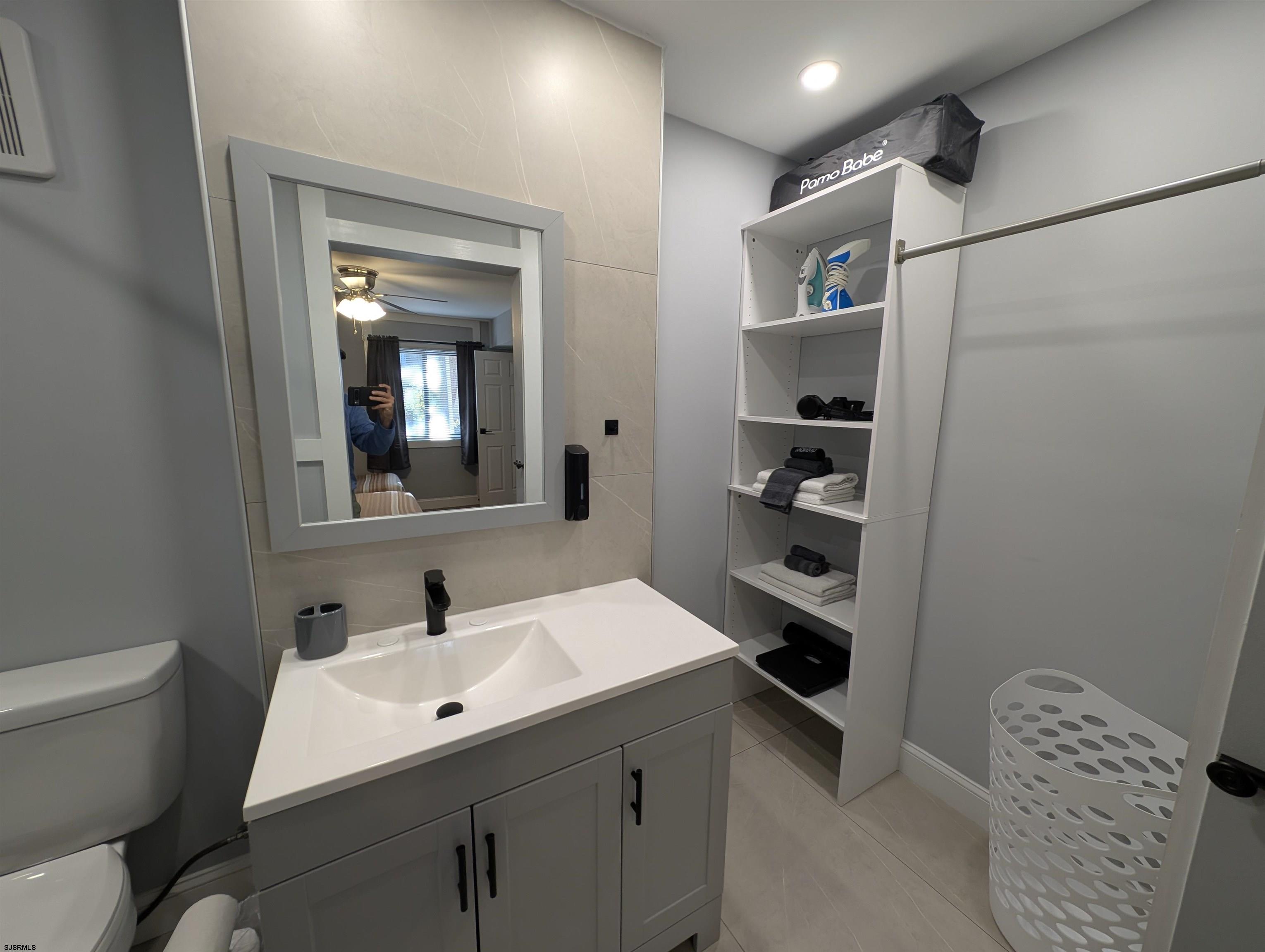 600 Pacific Avenue, Unit D102 Atlantic City, NJ 08401 - Photo 27 of 35 a bathroom with a sink a toilet and shower