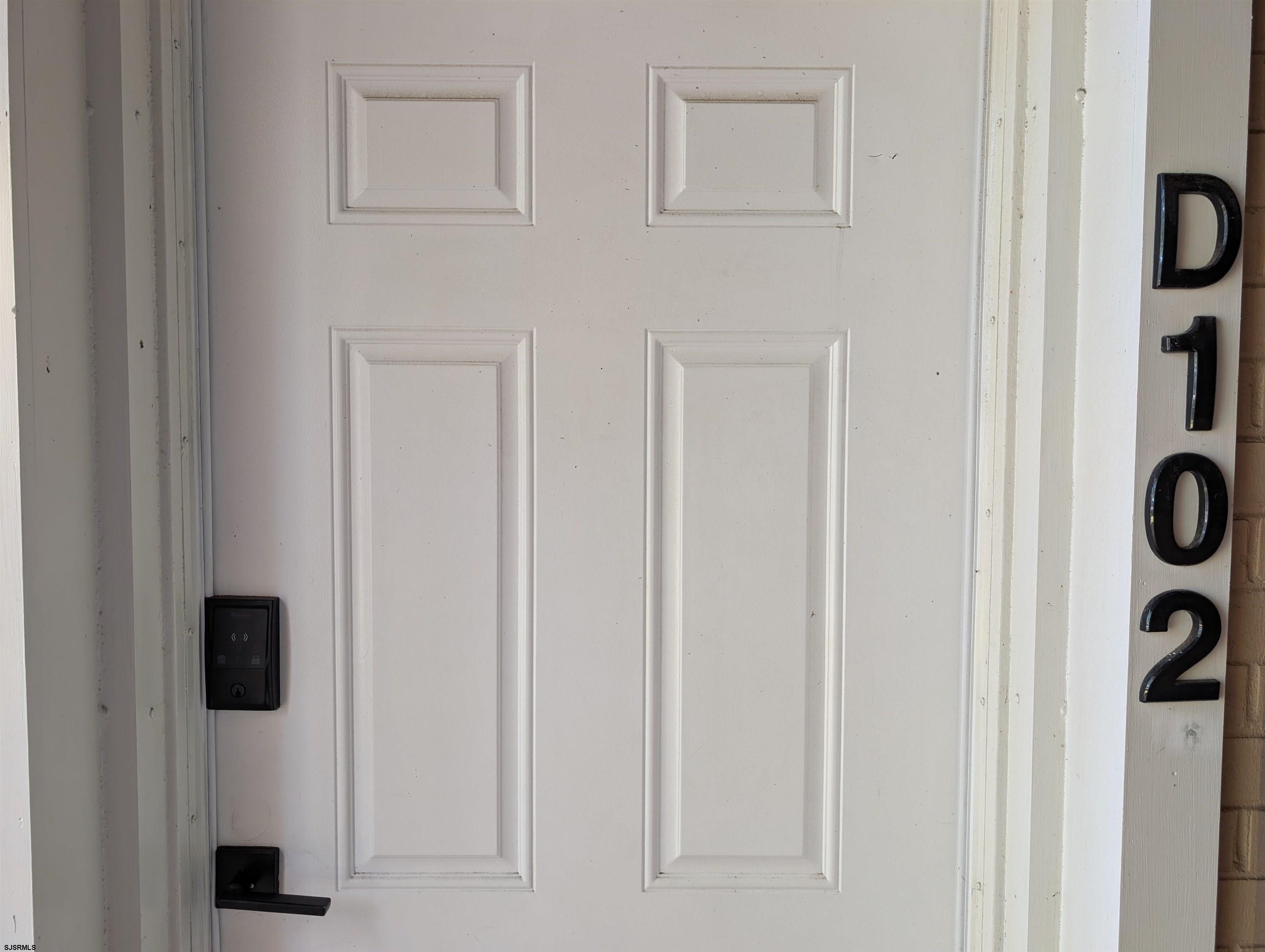 600 Pacific Avenue, Unit D102 Atlantic City, NJ 08401 - Photo 4 of 35 a view of a entryway with white door