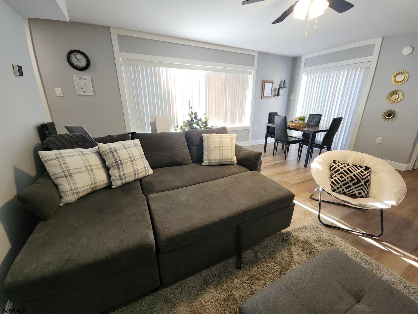 600 Pacific Avenue, Unit D102 Atlantic City, NJ 08401 - Photo 5 of 35 a living room with furniture rug and window