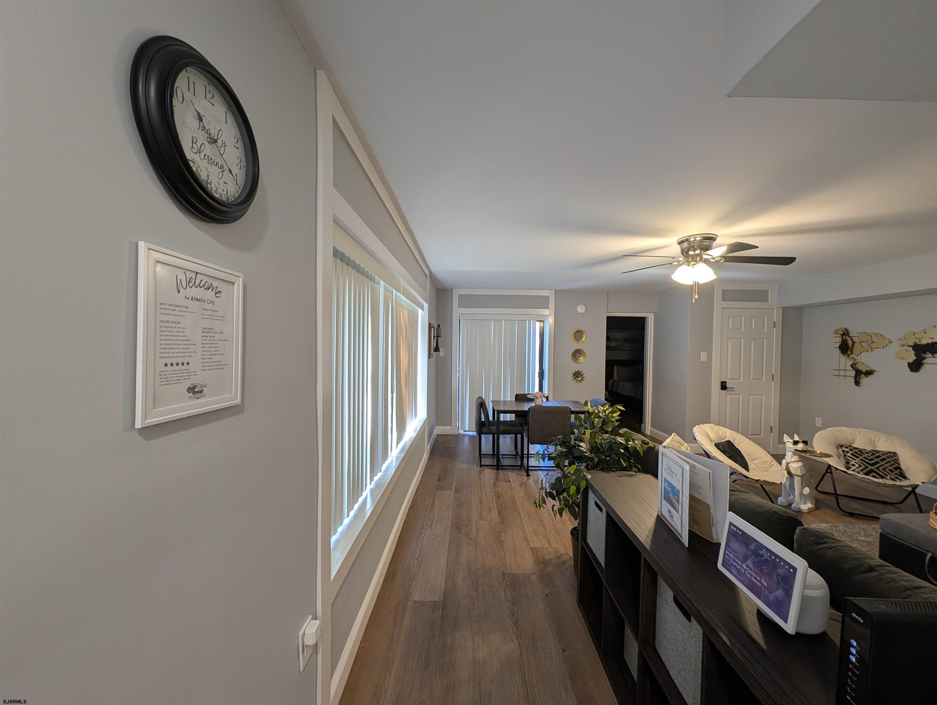 600 Pacific Avenue, Unit D102 Atlantic City, NJ 08401 - Photo 10 of 35 a view of a livingroom with furniture and hardwood floor