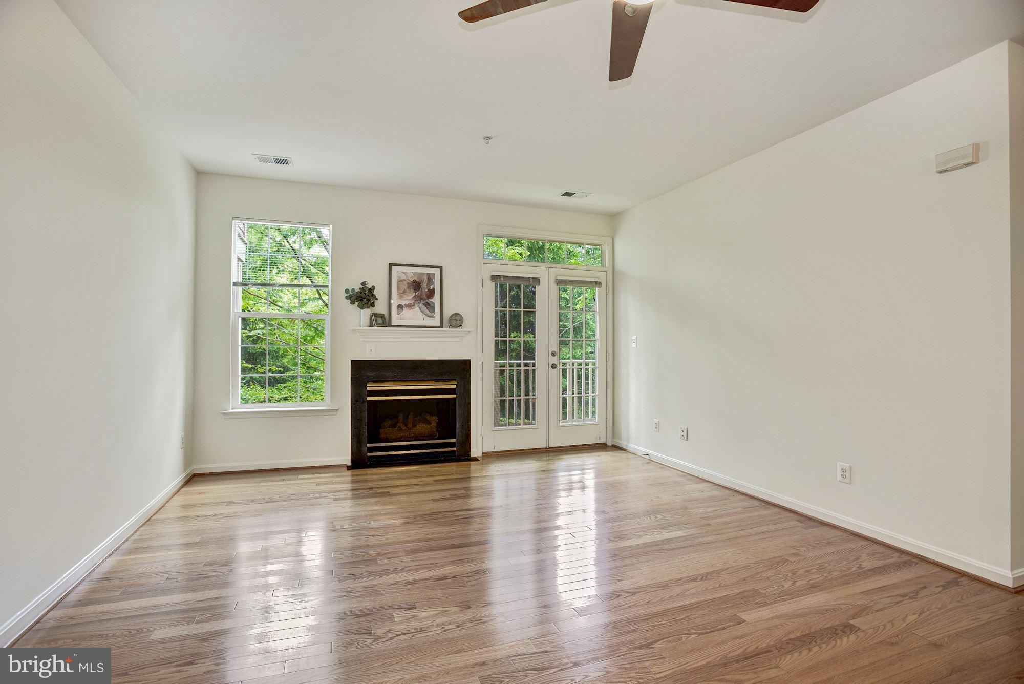 1307 Windleaf Drive, Unit 133 Reston, VA 20194 - Photo 5 of 26 Enjoy Cozy Gas Fireplace