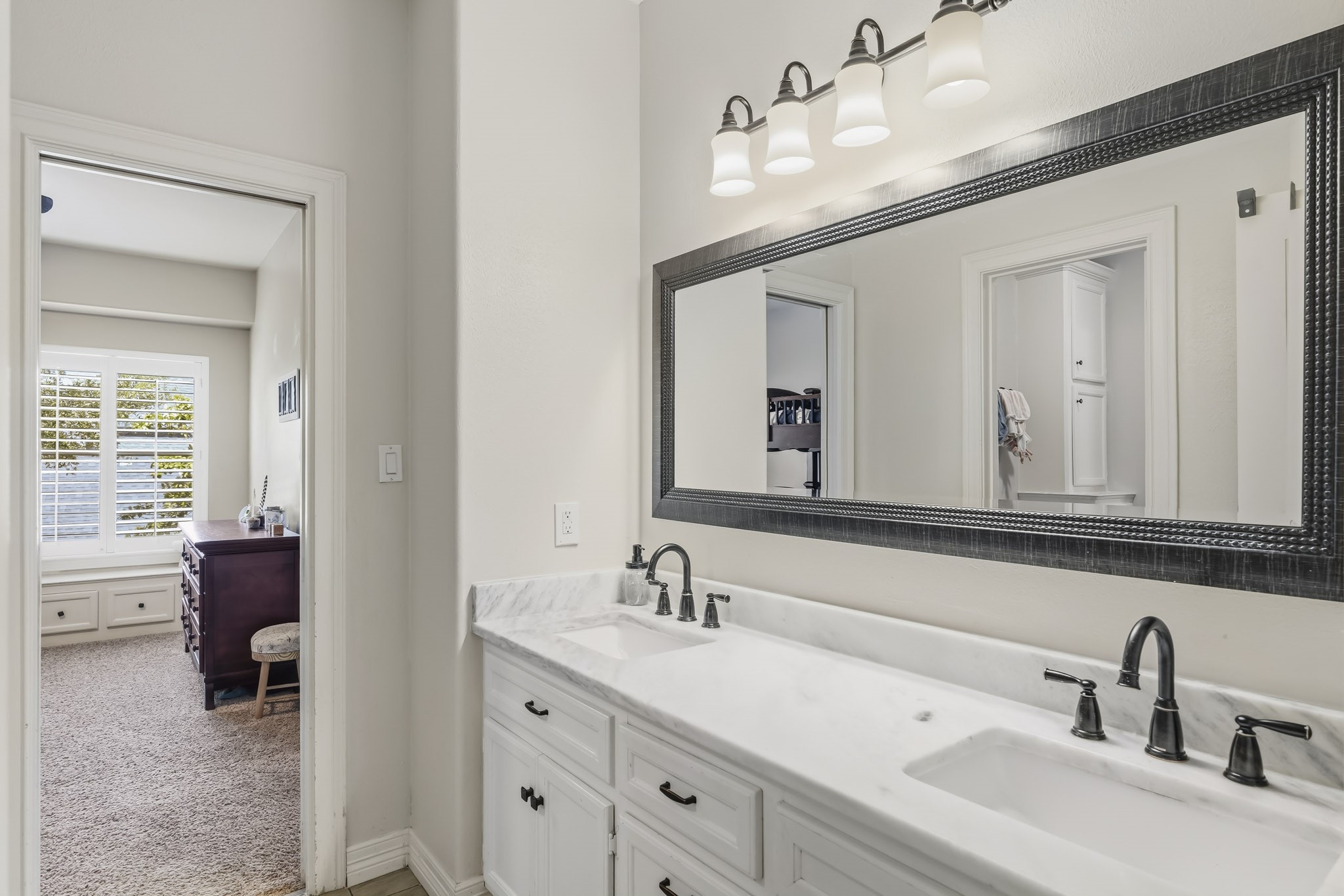 3630 Orca Court Spring, TX 77388 - Photo 41 of 50 Gorgeous Hollywood bath with dual sinks for effortless morning routines.