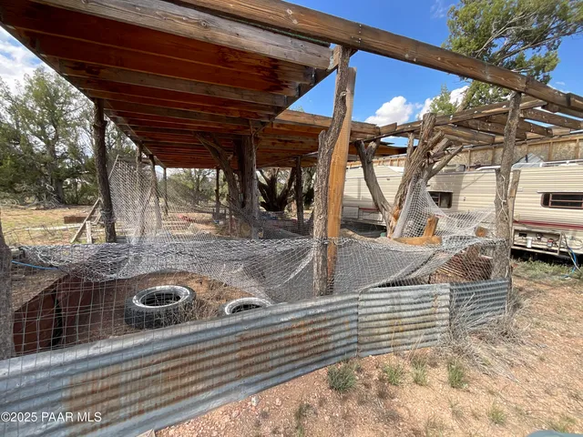 a view of a car parked in front of a house