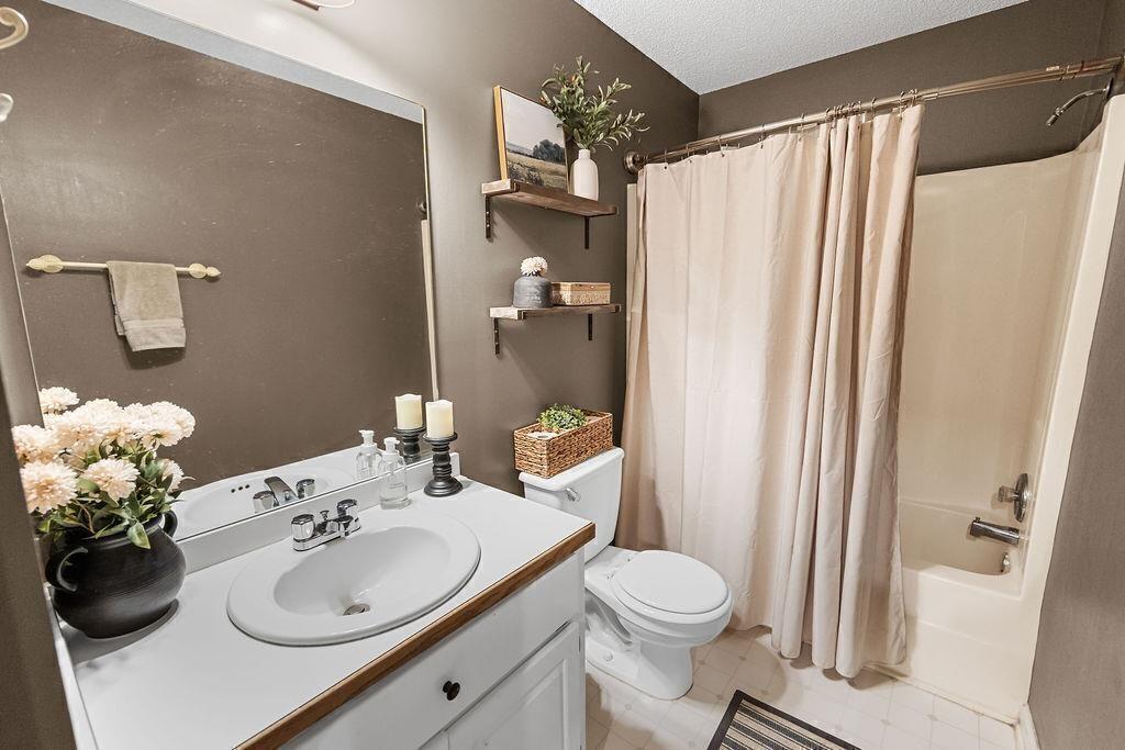 603 Cutoff Road Jasper, GA 30143 - Photo 19 of 24 a bathroom with a sink toilet and shower