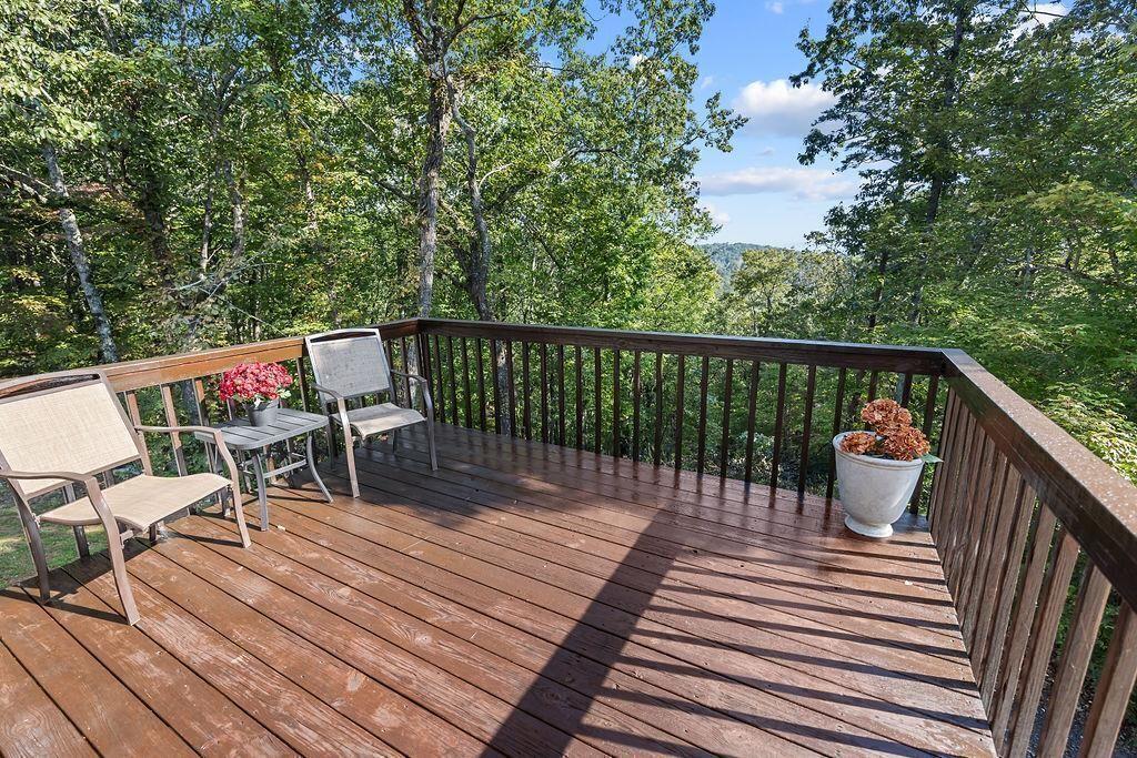 603 Cutoff Road Jasper, GA 30143 - Photo 8 of 24 a view of deck with chairs and wooden floor