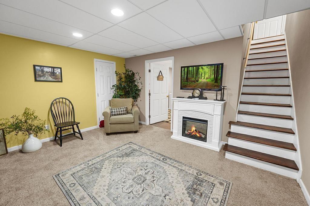 603 Cutoff Road Jasper, GA 30143 - Photo 9 of 24 a living room with furniture and a fireplace