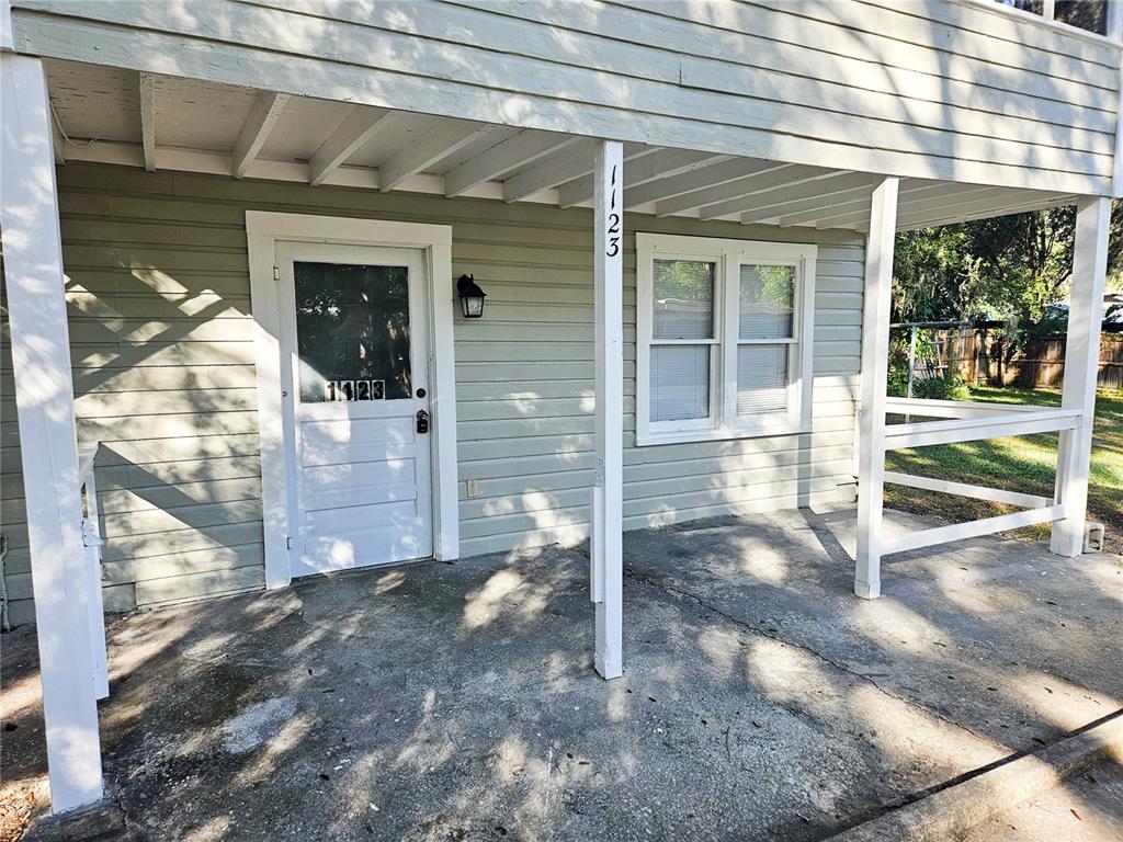 1123 South Tennessee Avenue Lakeland, FL 33803 - Photo 3 of 12 a view of a porch of the house