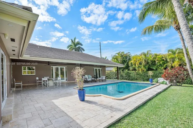 a view of outdoor space yard deck patio and swimming pool