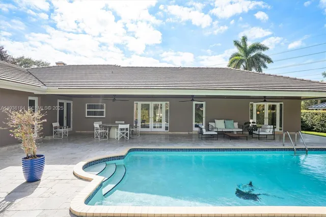 a house view with sitting space garden view with furniture