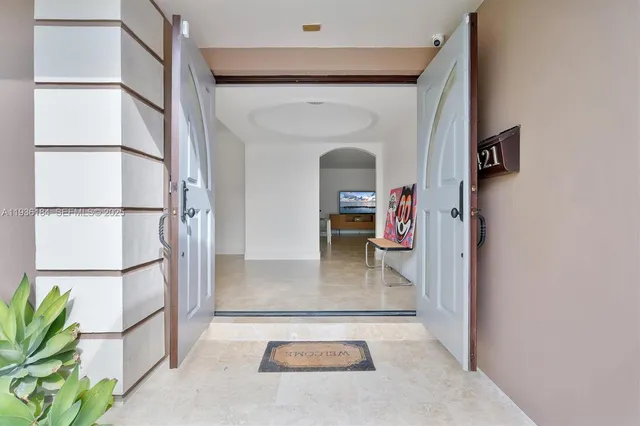 a view of a hallway view with staircase