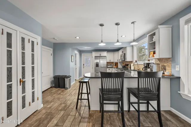 a view of a dining room with furniture