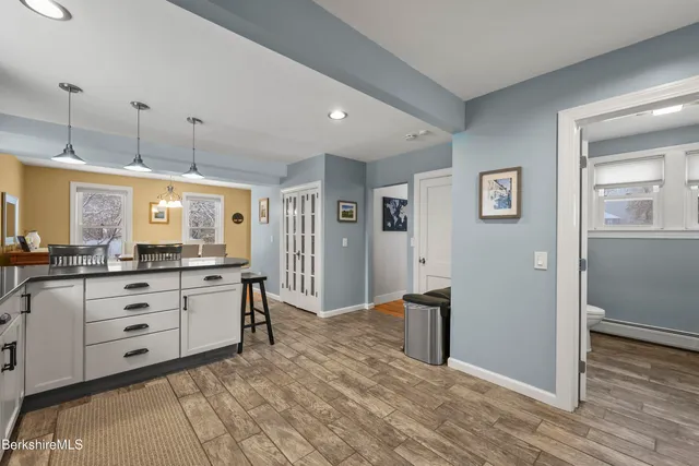 a room with window and cabinet