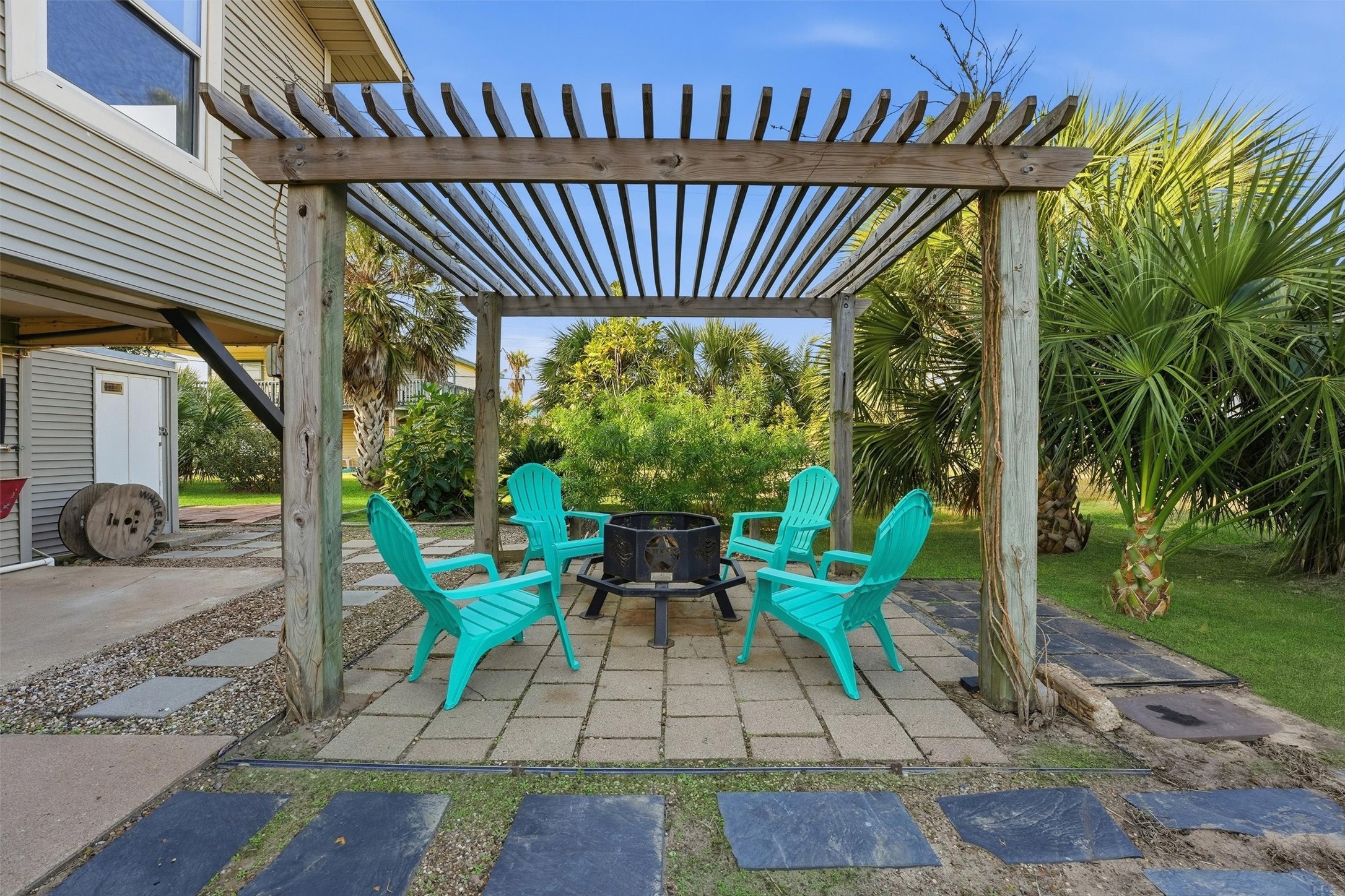 16530 Lewis Scot Road Jamaica Beach, TX 77554 - Photo 15 of 35 Pergola covered patio. Prime spot to relax by a firepit or entertain with a cookout area.