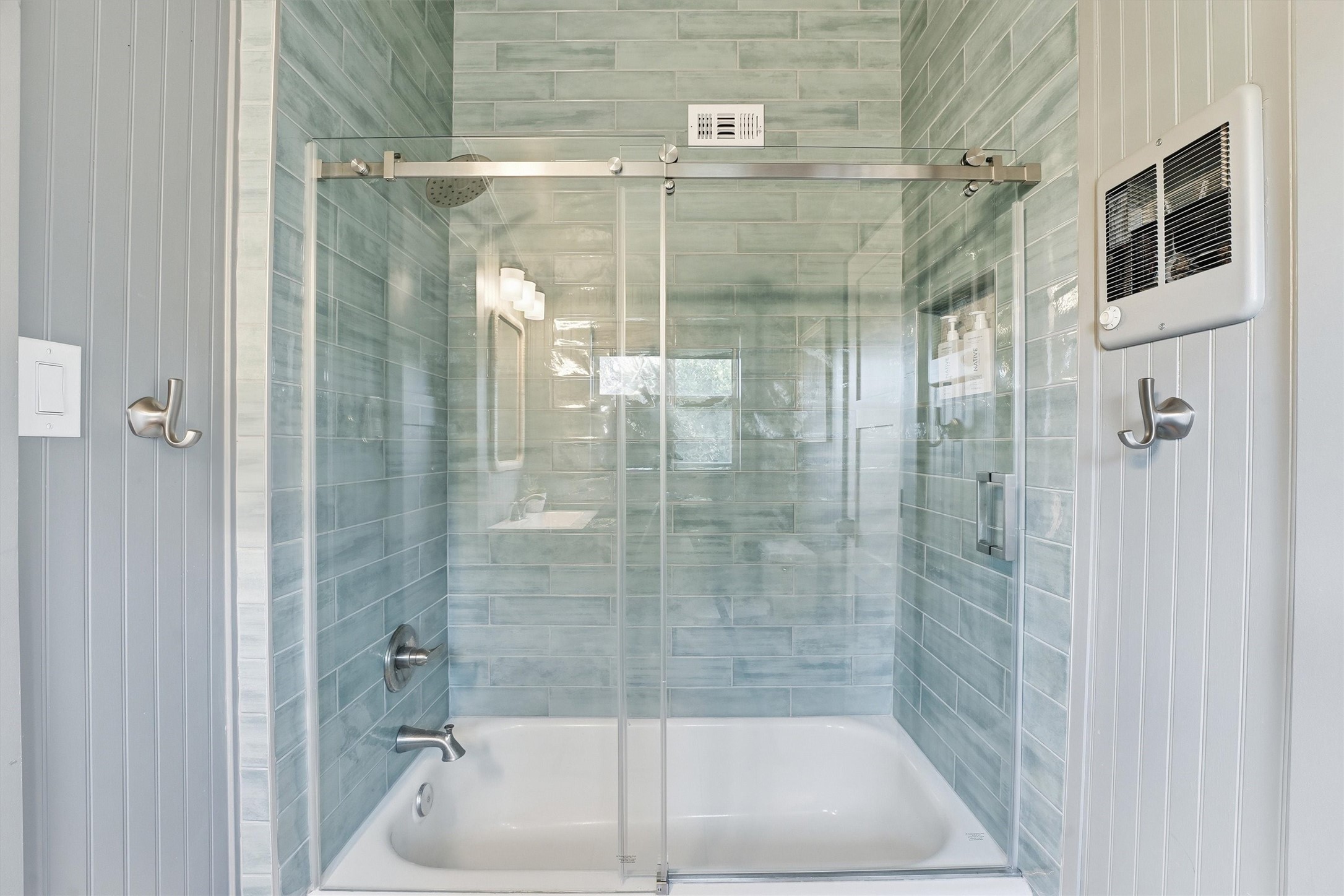 16530 Lewis Scot Road Jamaica Beach, TX 77554 - Photo 8 of 35 Newly tiled, spa-like shower.