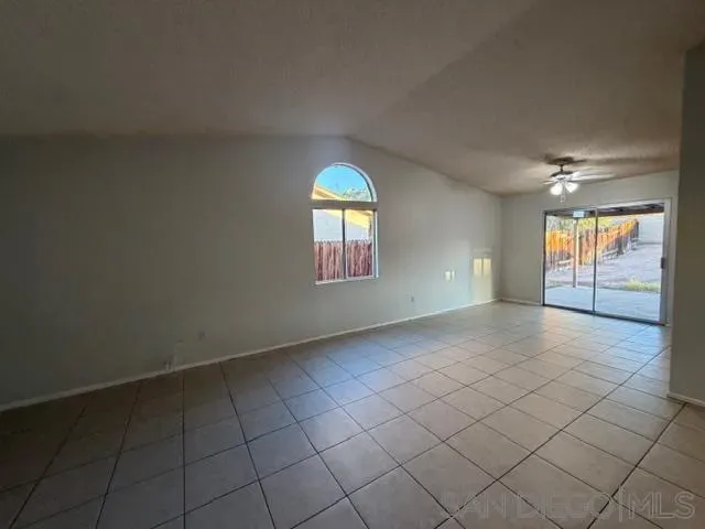 a utility room with cabinets