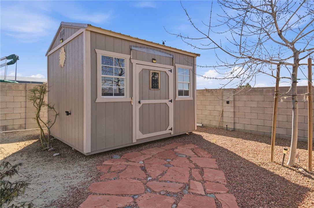 4745 East Old W Road Kingman, AZ 86401 - Photo 32 of 37 View of shed with a fenced backyard