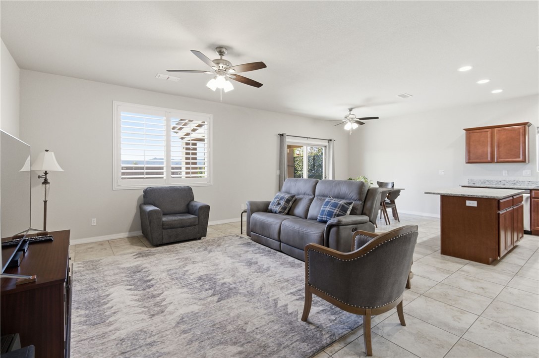 4745 East Old W Road Kingman, AZ 86401 - Photo 6 of 37 Living room with a ceiling fan, recessed lighting, and light tile patterned floors