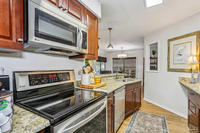 a kitchen with a stove and a microwave