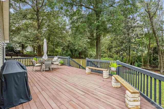 a view of a chairs and table on the wooden floor