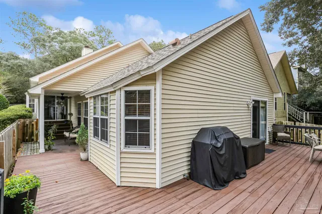 a view of a house with a yard and wooden floor