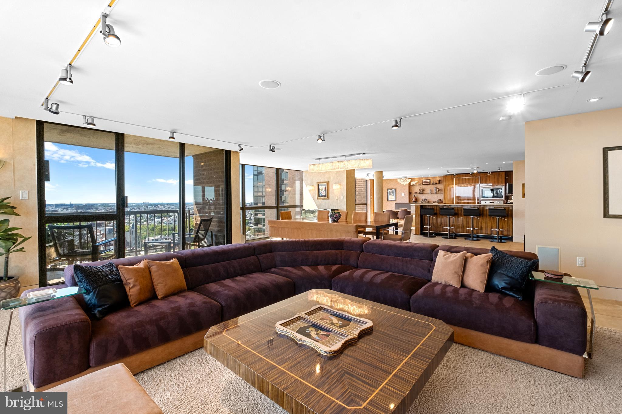 233 South 6th Street, Unit 2009 Philadelphia, PA 19106 - Photo 17 of 55 a living room with furniture and a flat screen tv