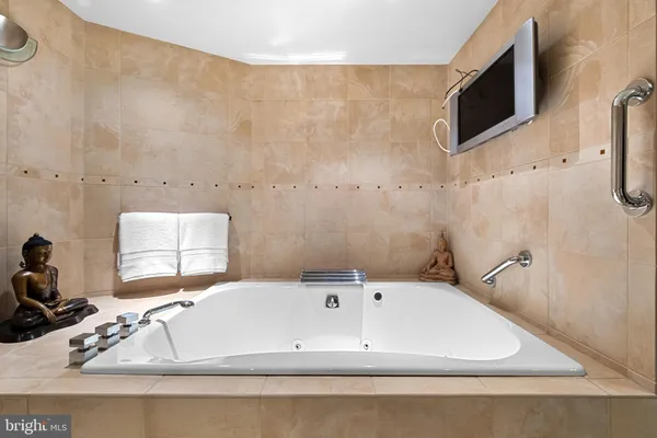 a bathroom with a shower and a toilet
