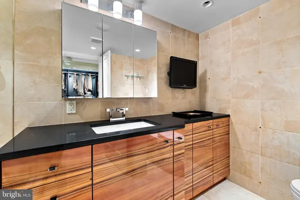a hallway with washer and dryer