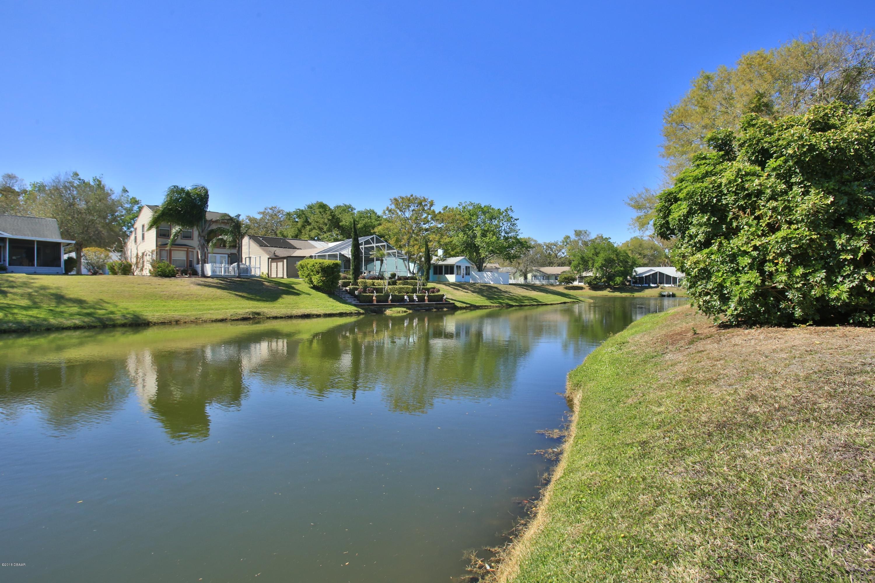 986 Deer Springs Road Port Orange, FL 32129 - Photo 2 of 26 Pond Front Lot