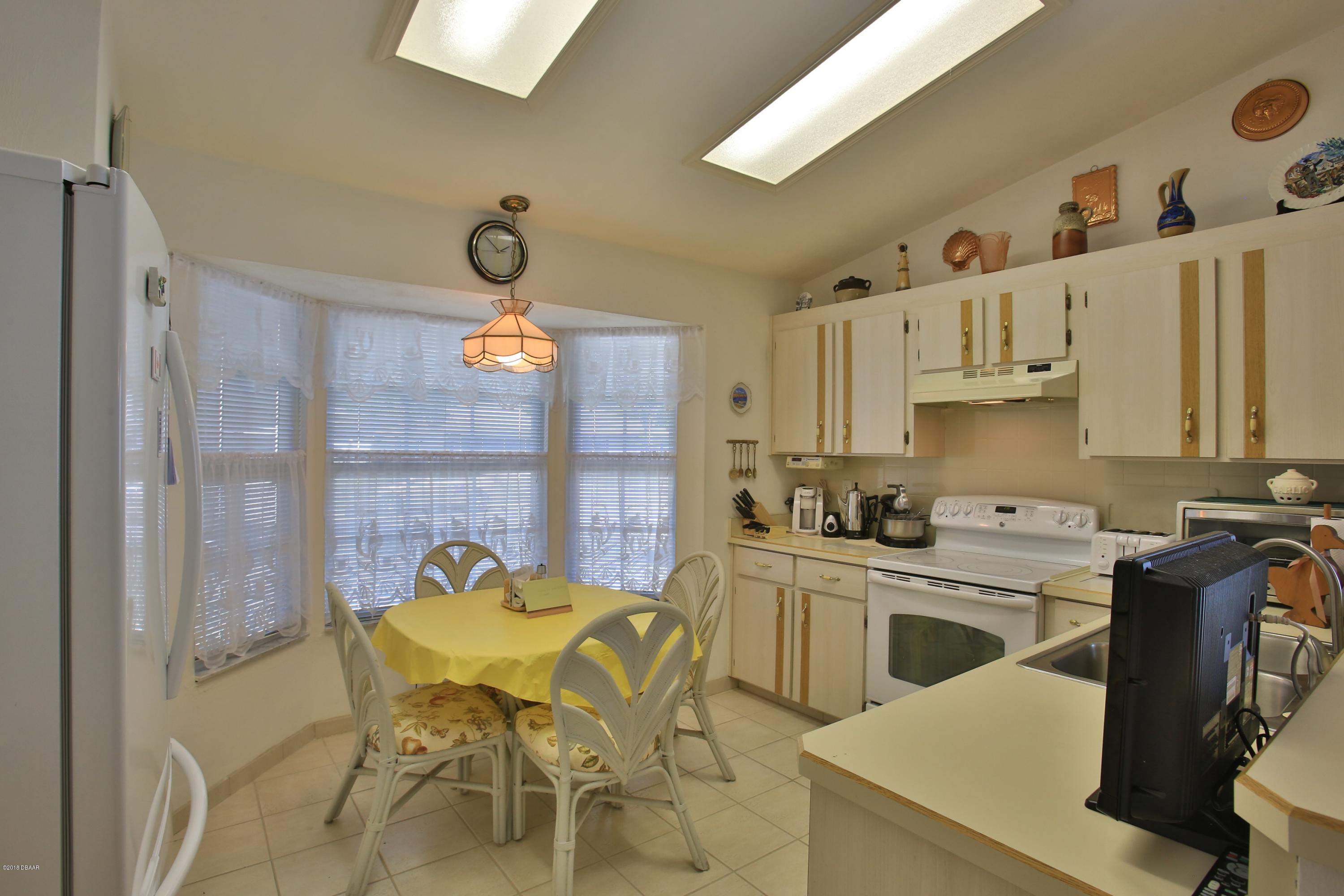 986 Deer Springs Road Port Orange, FL 32129 - Photo 4 of 26 Eat-in Kitchen