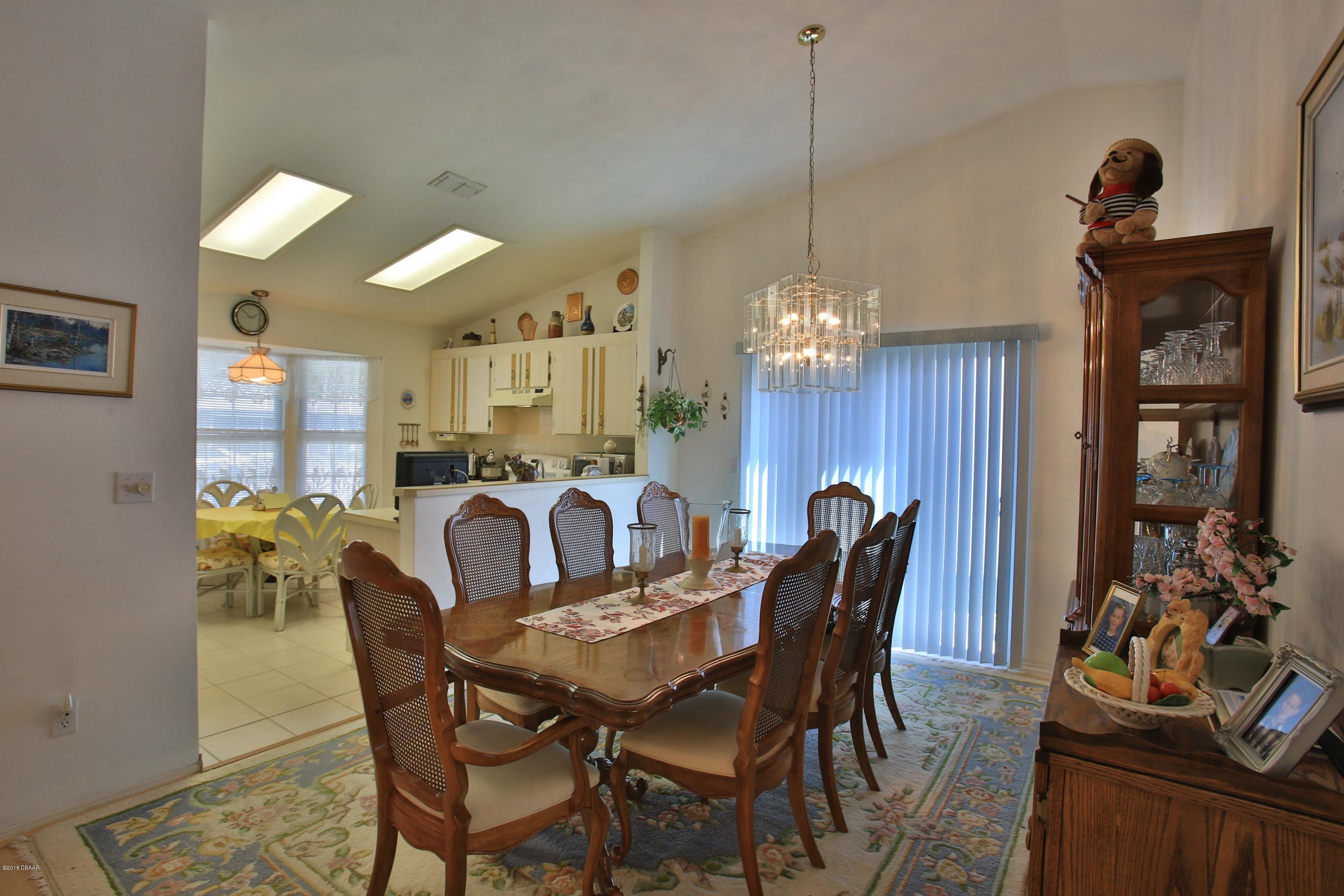 986 Deer Springs Road Port Orange, FL 32129 - Photo 7 of 26 Formal Dining Room