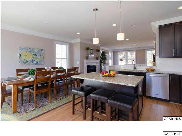 2120 Avinity Loop Charlottesville, VA 22902 - Photo 4 of 24 a open kitchen view with stainless steel appliances dining table and chairs