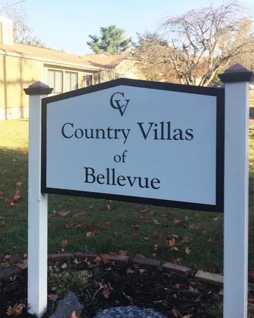 a sign broad on the side of the road