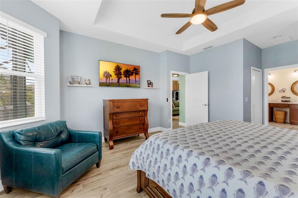 422 Good Life Way Daytona Beach, FL 32124 - Photo 22 of 79 a bedroom with a bed and a couch