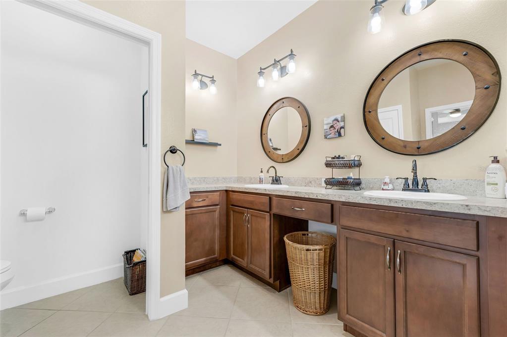 422 Good Life Way Daytona Beach, FL 32124 - Photo 25 of 79 a bathroom with a sink and a mirror