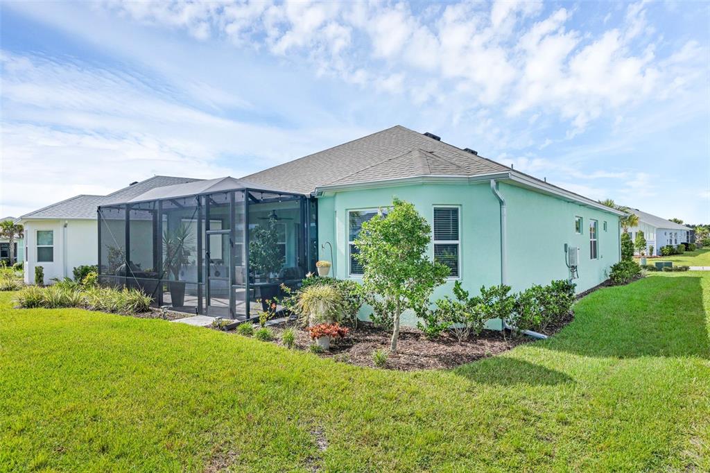 422 Good Life Way Daytona Beach, FL 32124 - Photo 32 of 79 a front view of house with yard and green space