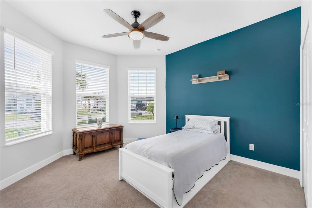 422 Good Life Way Daytona Beach, FL 32124 - Photo 34 of 79 a bedroom with a bed and a window