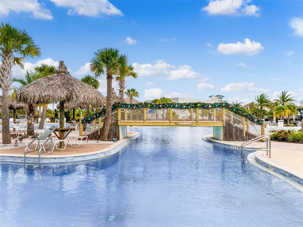 422 Good Life Way Daytona Beach, FL 32124 - Photo 51 of 79 a view of a swimming pool and an outdoor seating