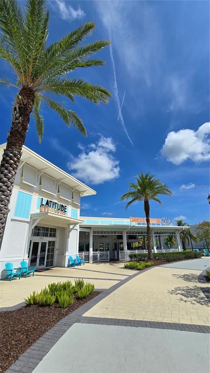 422 Good Life Way Daytona Beach, FL 32124 - Photo 52 of 79 a front view of a building with a yard