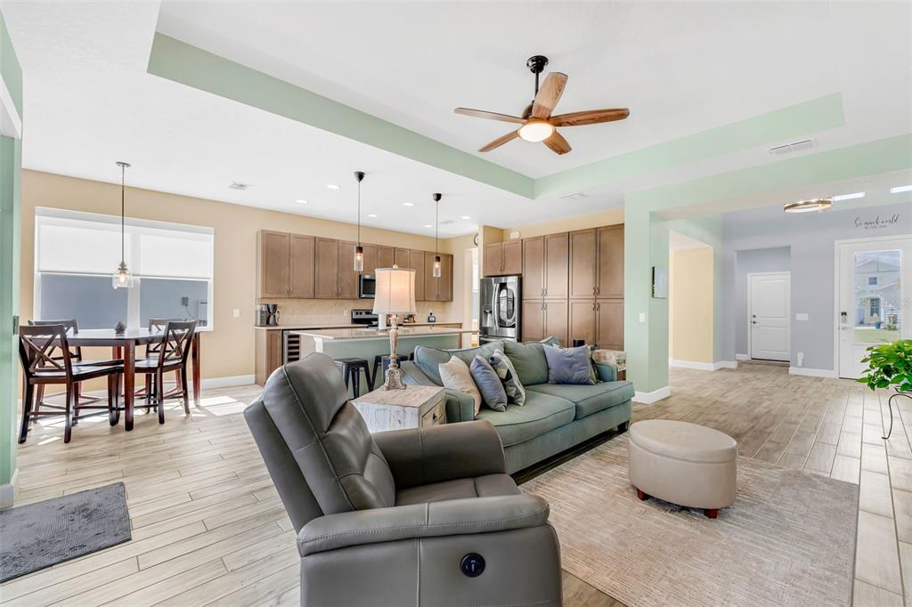422 Good Life Way Daytona Beach, FL 32124 - Photo 7 of 79 a living room with furniture and a large window